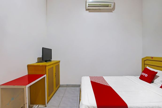 Imagen de la habitación del Hotel OYO 3060 Al Fatih Guest House Syariah. Foto 9