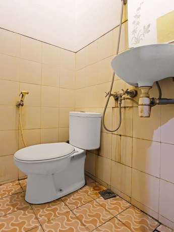 Imagen de la habitación del Hotel OYO 3060 Al Fatih Guest House Syariah. Foto 11