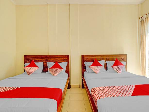 Imagen de la habitación del Hotel OYO 3062 Pondok Wisata Dewata. Foto 5