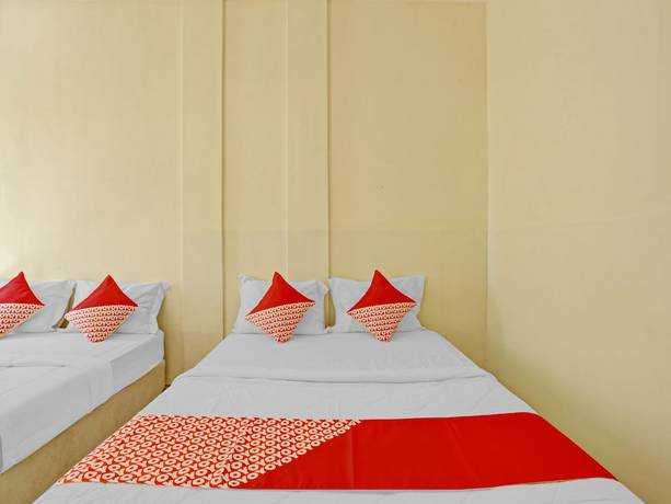 Imagen de la habitación del Hotel OYO 3062 Pondok Wisata Dewata. Foto 6