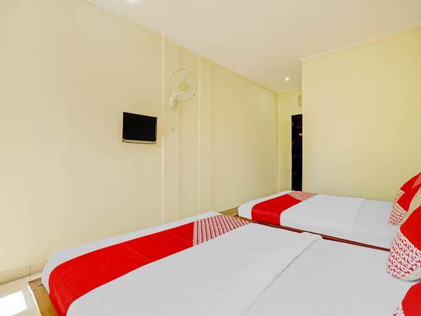 Imagen de la habitación del Hotel OYO 3062 Pondok Wisata Dewata. Foto 8