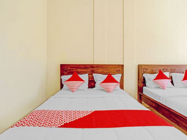 Imagen de la habitación del Hotel OYO 3062 Pondok Wisata Dewata. Foto 10