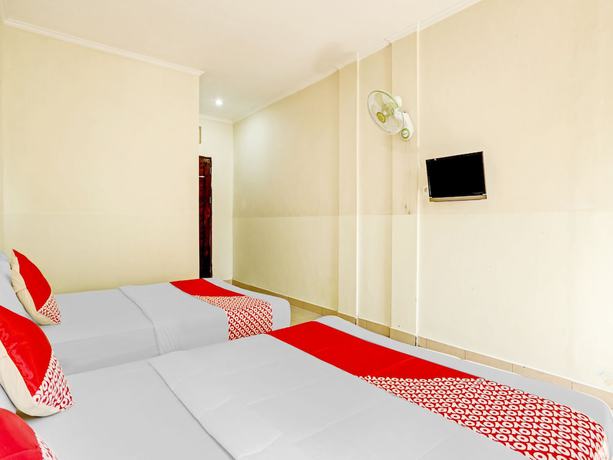 Imagen de la habitación del Hotel OYO 3062 Pondok Wisata Dewata. Foto 11