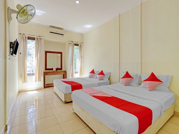 Imagen de la habitación del Hotel OYO 3062 Pondok Wisata Dewata. Foto 12