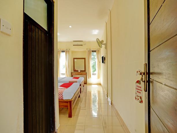 Imagen de la habitación del Hotel OYO 3062 Pondok Wisata Dewata. Foto 13