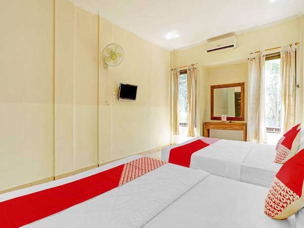 Imagen de la habitación del Hotel OYO 3062 Pondok Wisata Dewata. Foto 15