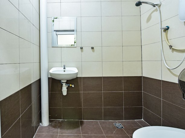 Imagen de la habitación del Hotel OYO 3083 D Kost 3 Syariah. Foto 2