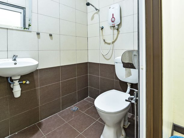 Imagen de la habitación del Hotel OYO 3083 D Kost 3 Syariah. Foto 6