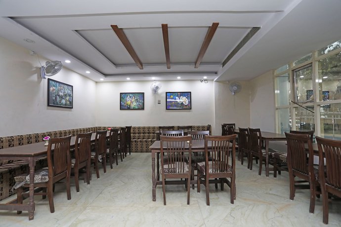 Imagen del bar/restaurante del Hotel OYO 30933 Moriya Palace. Foto 3