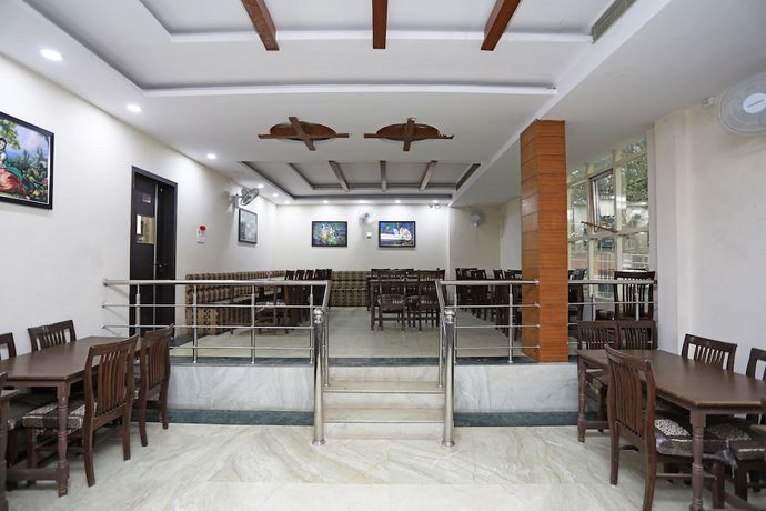 Imagen del bar/restaurante del Hotel OYO 30933 Moriya Palace. Foto 4