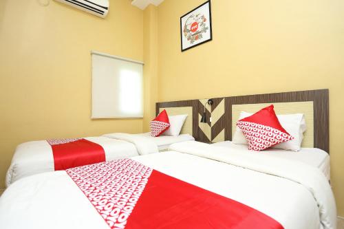 Imagen de la habitación del Hotel OYO 3154 City Inn. Foto 9