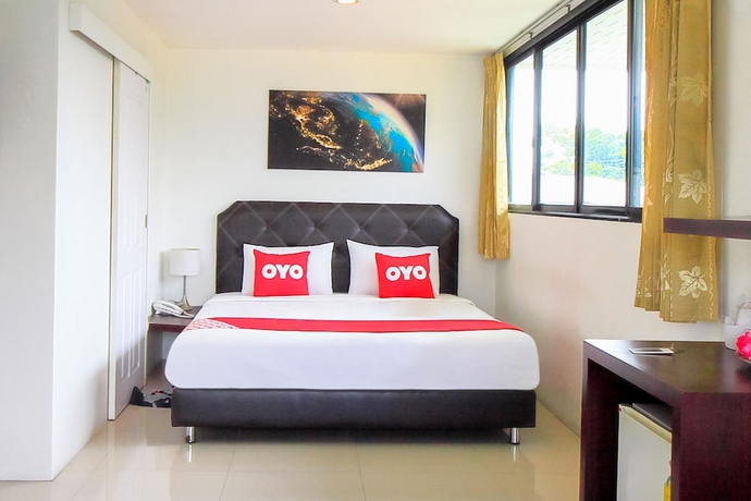 Imagen de la habitación del Hotel OYO 318 Pak D Resort. Foto 4