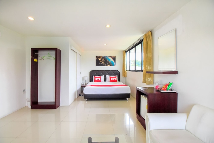 Imagen de la habitación del Hotel OYO 318 Pak D Resort. Foto 5