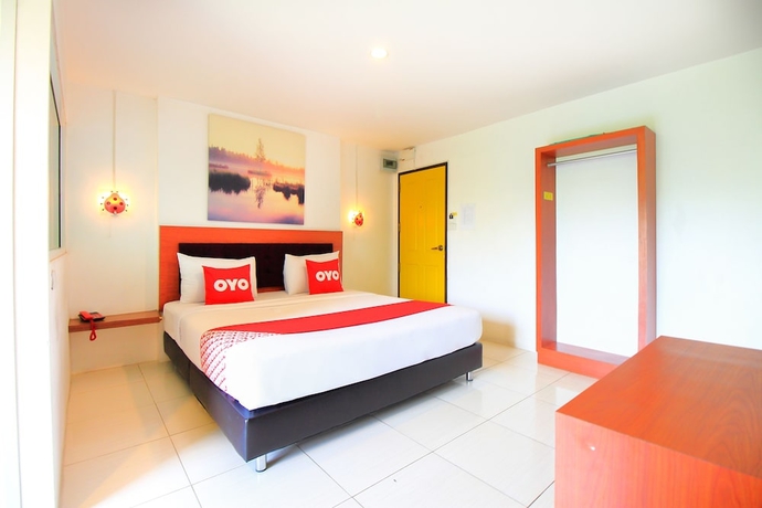 Imagen de la habitación del Hotel OYO 318 Pak D Resort. Foto 9