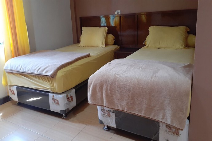 Imagen de la habitación del Hotel OYO 3184 Grand Blang Asan. Foto 1
