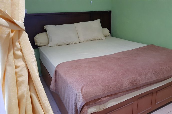 Imagen de la habitación del Hotel OYO 3184 Grand Blang Asan. Foto 3