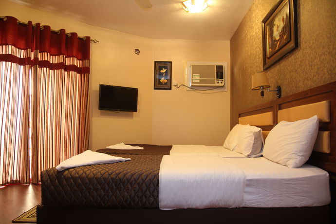 Imagen de la habitación del Hotel OYO 329 Down Town. Foto 6