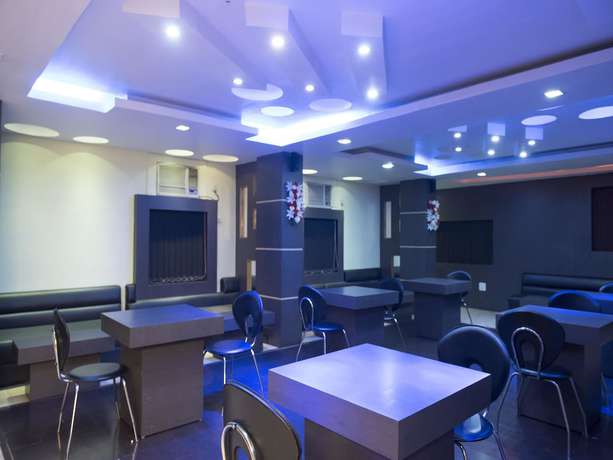 Imagen del bar/restaurante del Hotel OYO 3356 Green Valley. Foto 3