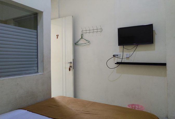 Imagen de la habitación del Hotel OYO 3499 J8. Foto 5