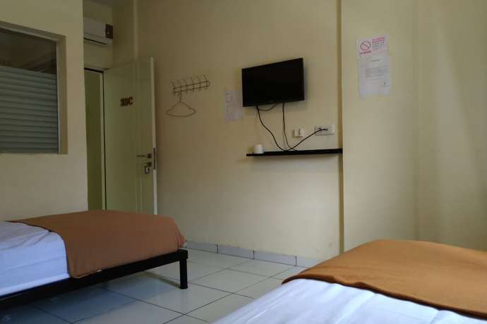 Imagen de la habitación del Hotel OYO 3499 J8. Foto 7