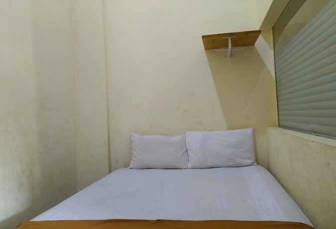 Imagen de la habitación del Hotel OYO 3499 J8. Foto 12