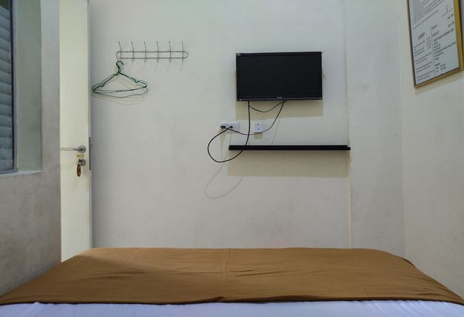 Imagen de la habitación del Hotel OYO 3499 J8. Foto 13