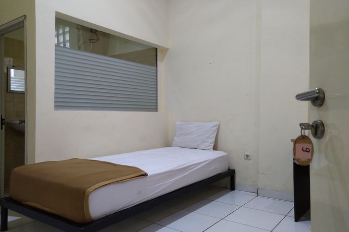 Imagen de la habitación del Hotel OYO 3499 J8. Foto 14