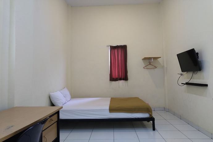 Imagen de la habitación del Hotel OYO 3499 J8. Foto 15