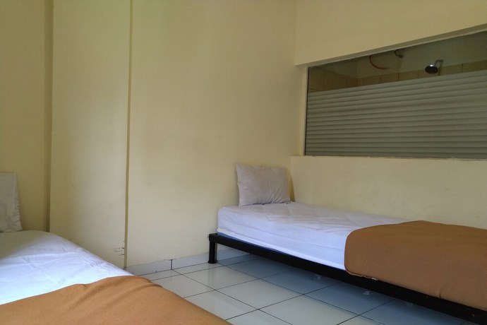 Imagen de la habitación del Hotel OYO 3499 J8. Foto 16