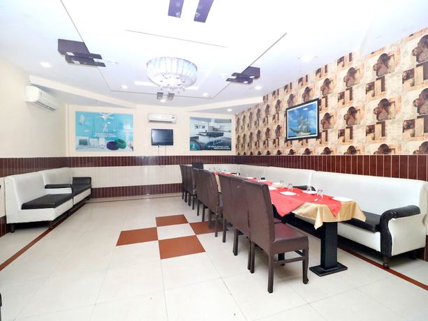 Imagen del bar/restaurante del Hotel OYO 3509 Celebration. Foto 4