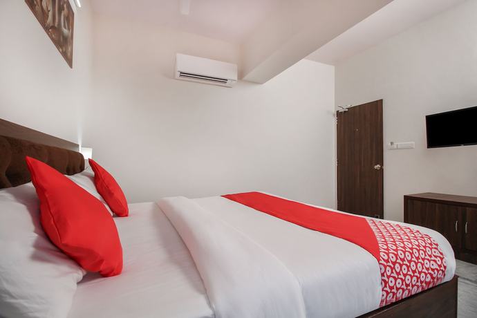 Imagen de la habitación del Hotel OYO 35787 Lotus. Foto 11