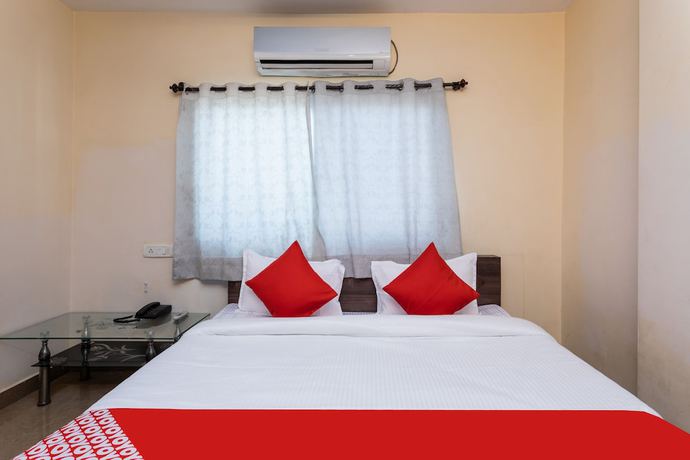 Imagen de la habitación del Hotel OYO 36211 Padma Palace. Foto 6