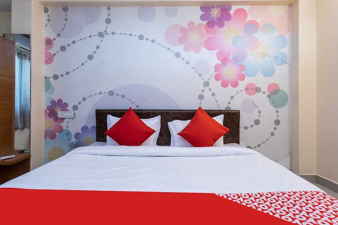 Imagen de la habitación del Hotel OYO 36211 Padma Palace. Foto 10