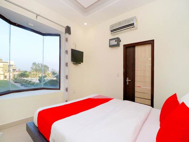 Imagen de la habitación del Hotel OYO 36854 Sangam Resort. Foto 7