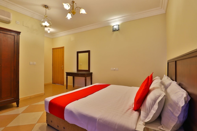 Imagen de la habitación del Hotel OYO 369 Arwa Alqosor. Foto 8
