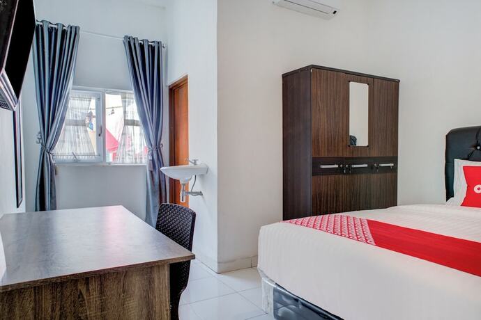 Imagen de la habitación del Hotel OYO 3690 Wisma Yani Syariah. Foto 17