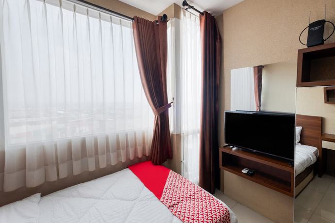 Imagen de la habitación del Hotel OYO 3691 Apartment Saladin Mansion. Foto 4