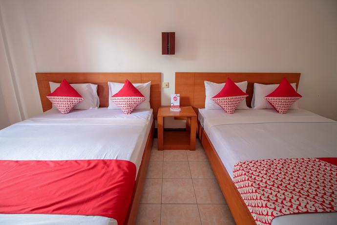 Imagen de la habitación del Hotel OYO 370 Sofia Pangandaran. Foto 9