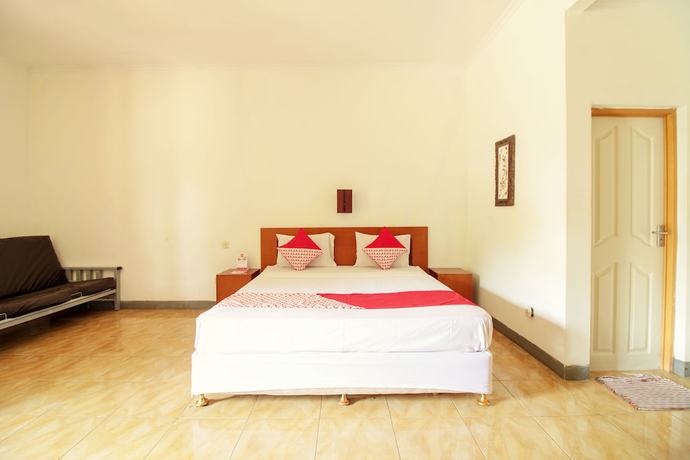 Imagen de la habitación del Hotel OYO 370 Sofia Pangandaran. Foto 10