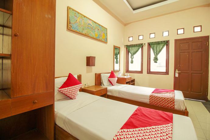 Imagen de la habitación del Hotel OYO 370 Sofia Pangandaran. Foto 11