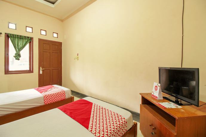 Imagen de la habitación del Hotel OYO 370 Sofia Pangandaran. Foto 18