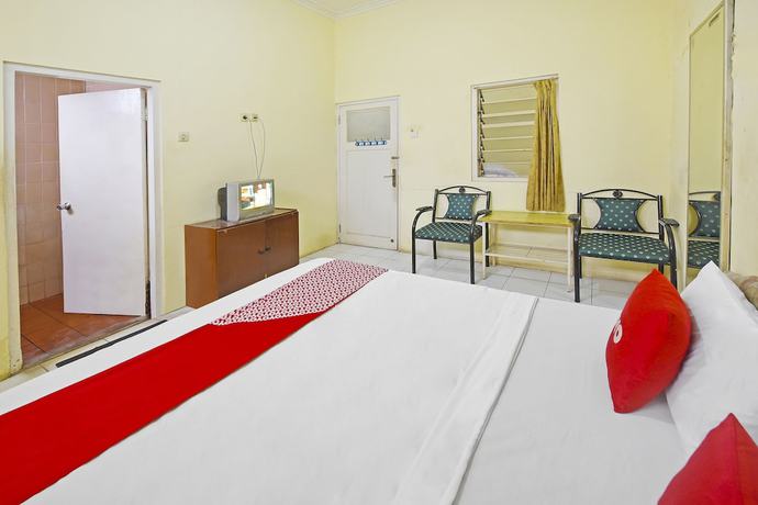 Imagen de la habitación del Hotel OYO 3722 Mutiara. Foto 2