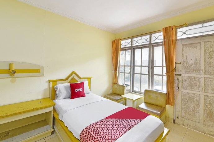 Imagen de la habitación del Hotel OYO 3722 Mutiara. Foto 5
