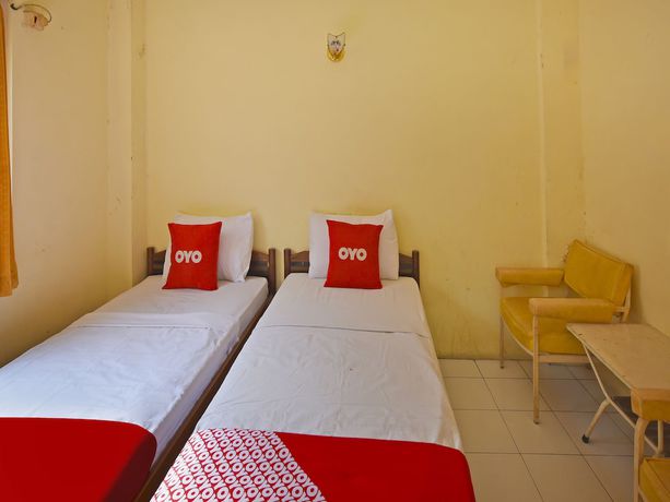 Imagen de la habitación del Hotel OYO 3722 Mutiara. Foto 6