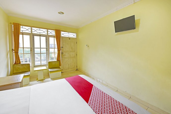 Imagen de la habitación del Hotel OYO 3722 Mutiara. Foto 8