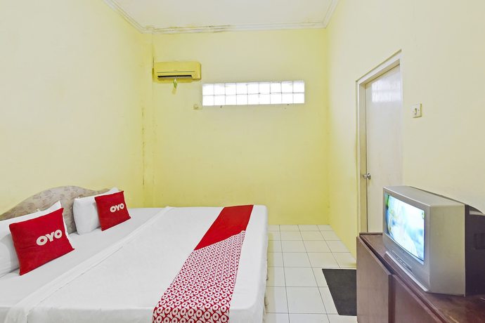 Imagen de la habitación del Hotel OYO 3722 Mutiara. Foto 9