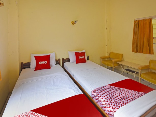 Imagen de la habitación del Hotel OYO 3722 Mutiara. Foto 10