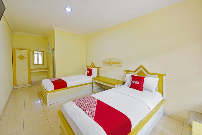 Imagen de la habitación del Hotel OYO 3722 Mutiara. Foto 11