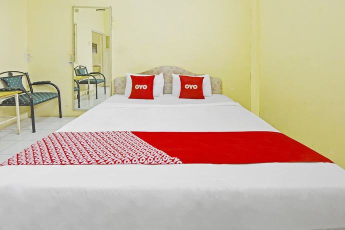 Imagen de la habitación del Hotel OYO 3722 Mutiara. Foto 12