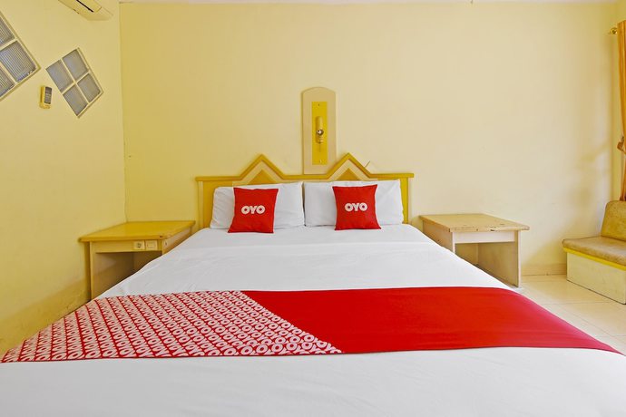 Imagen de la habitación del Hotel OYO 3722 Mutiara. Foto 13